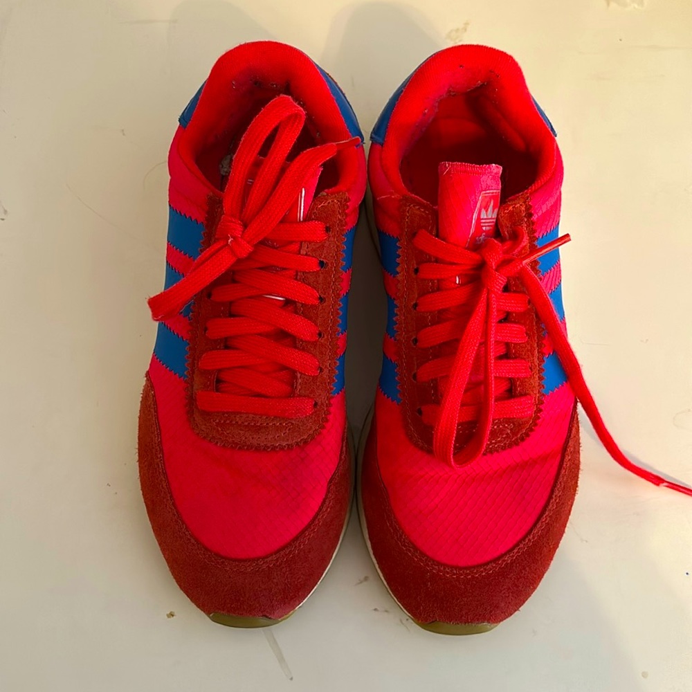 Red and blue adidas woman’s size 7